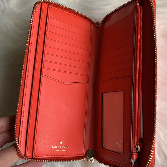 kate spade Handbags - Kate Spade Orange Wristlet NEW